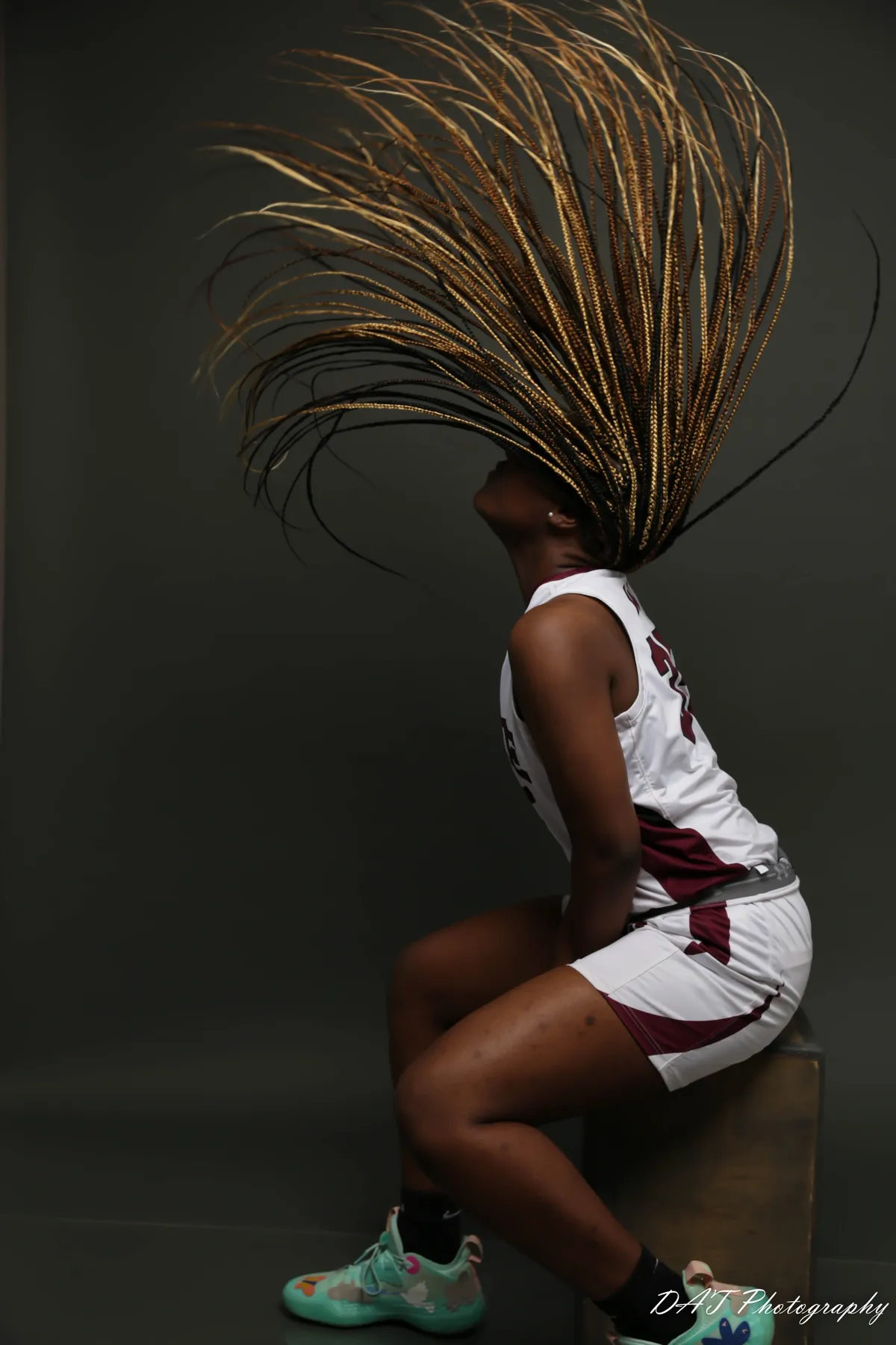 Creative sports portrait with dramatic hair movement