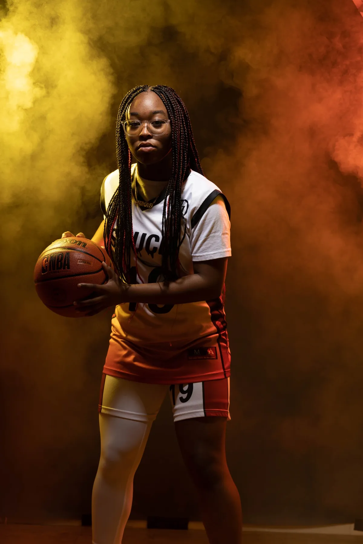 Basketball player with dramatic smoke effects
